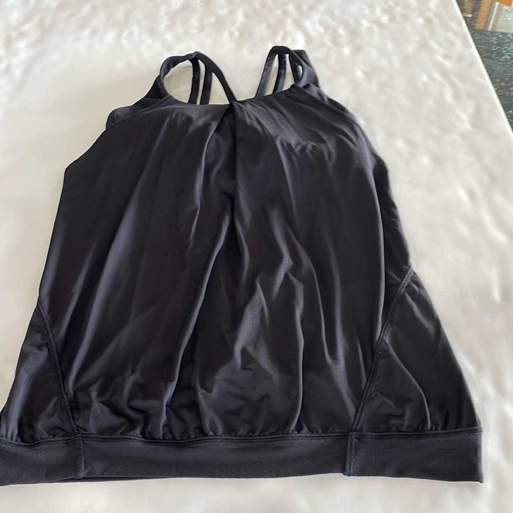 Lululemon running top with built in bra. Size small.